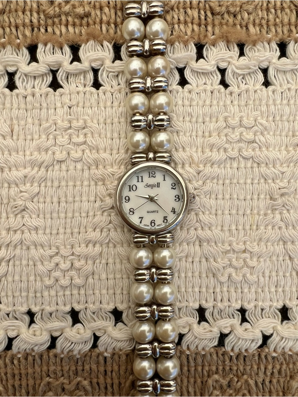 Vintage pearl bracelet watch with timeless charm